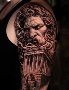 Black and grey Zeus and Greek temple tattoo sleeve, created at Monochrome Tattoo Studio in Fresno, CA. A masterpiece of realism and fine line detail by the best tattoo artist in Fresno.